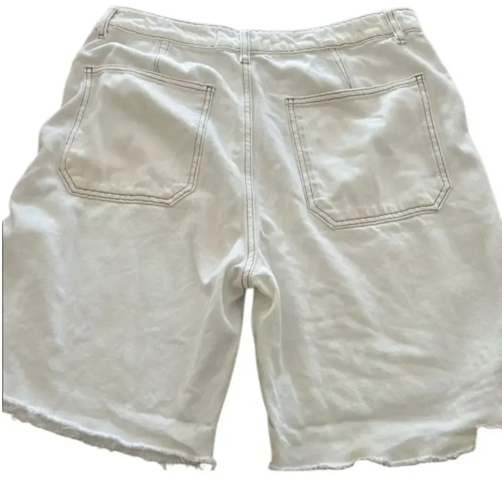 Reformation Off-White Denim cut off Shorts size 31
